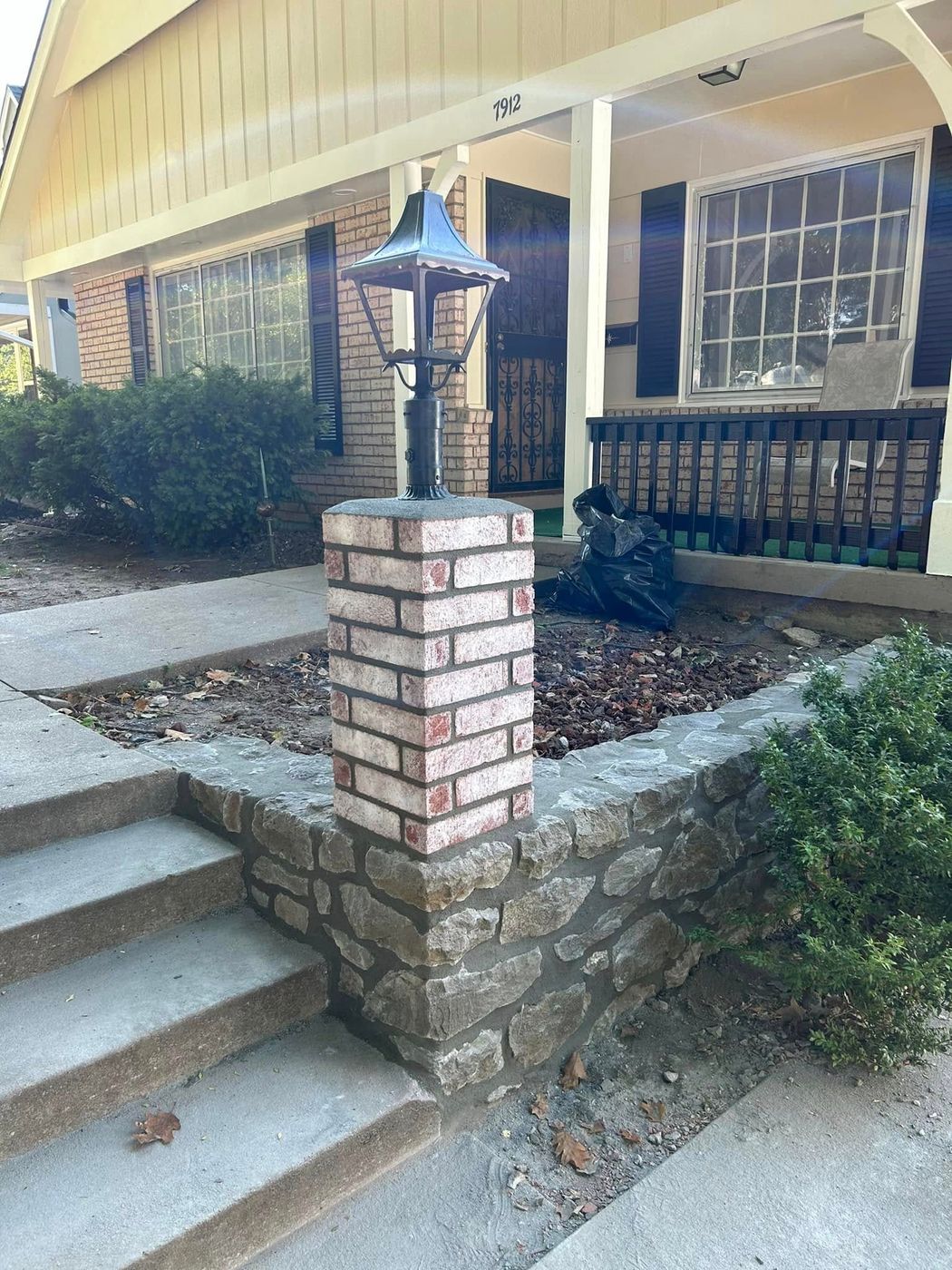 Brick lamp post column rebuilt