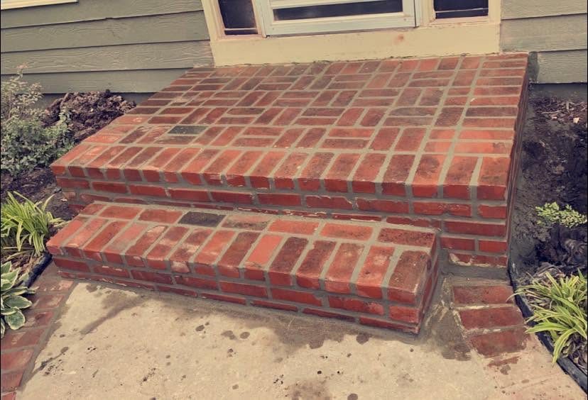 Same brick steps repaired and repointed