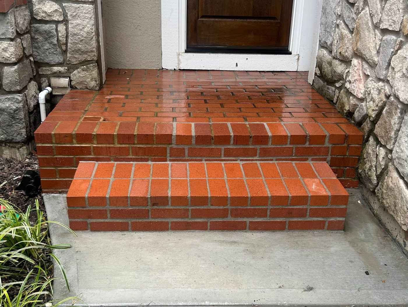 Brick step rebuilt in new red brick