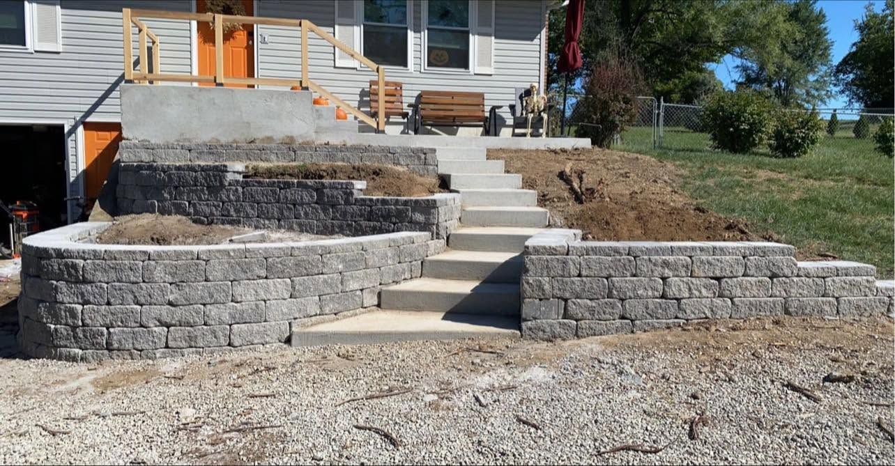 Tiered block retaining walls with new steps