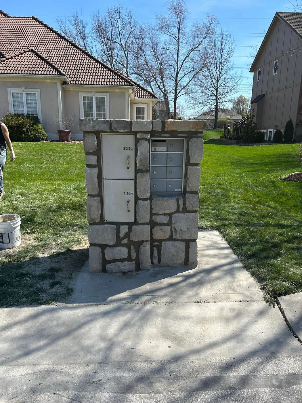 Stone mailbox column rebuilt