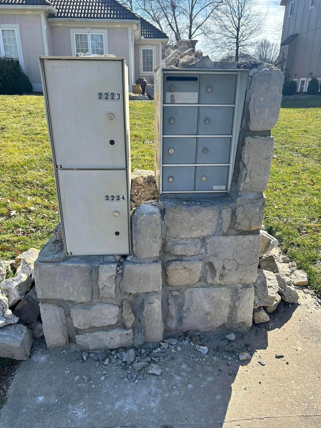 Stone mailbox column knocked apart