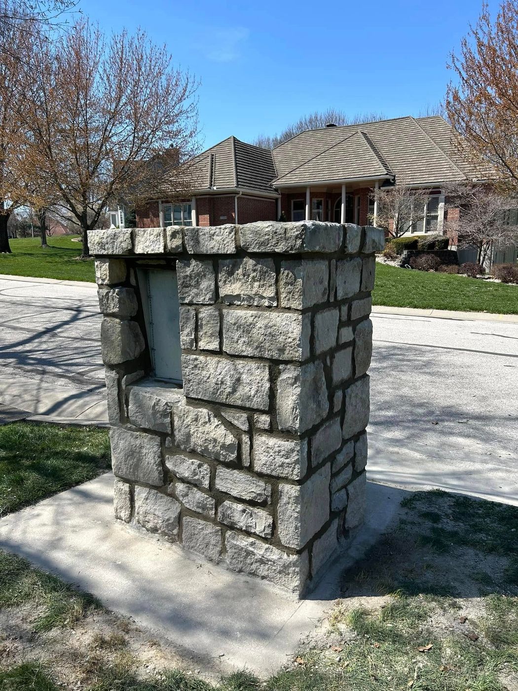 Stone mailbox column rebuilt