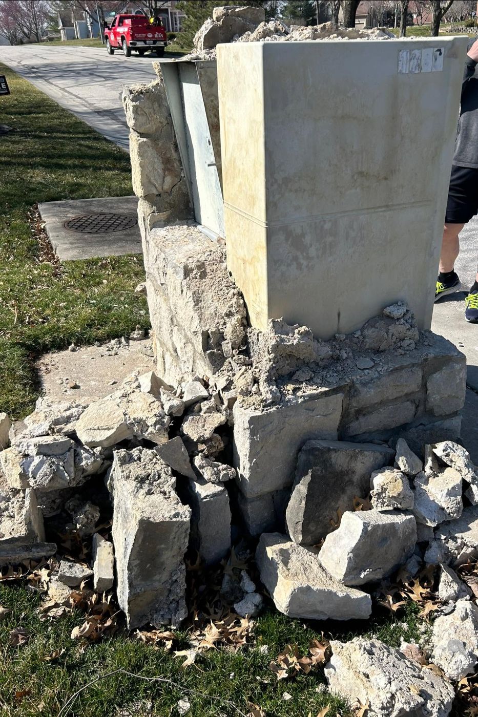 Stone mailbox column broken apart