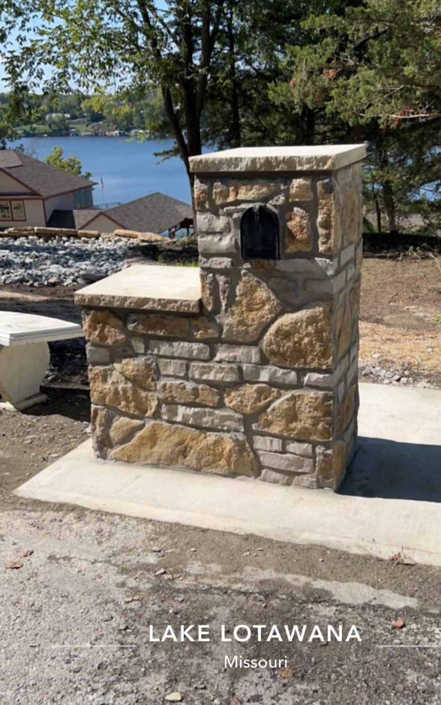 Fieldstone mailbox column with a planter ledge at Lake Lotawana