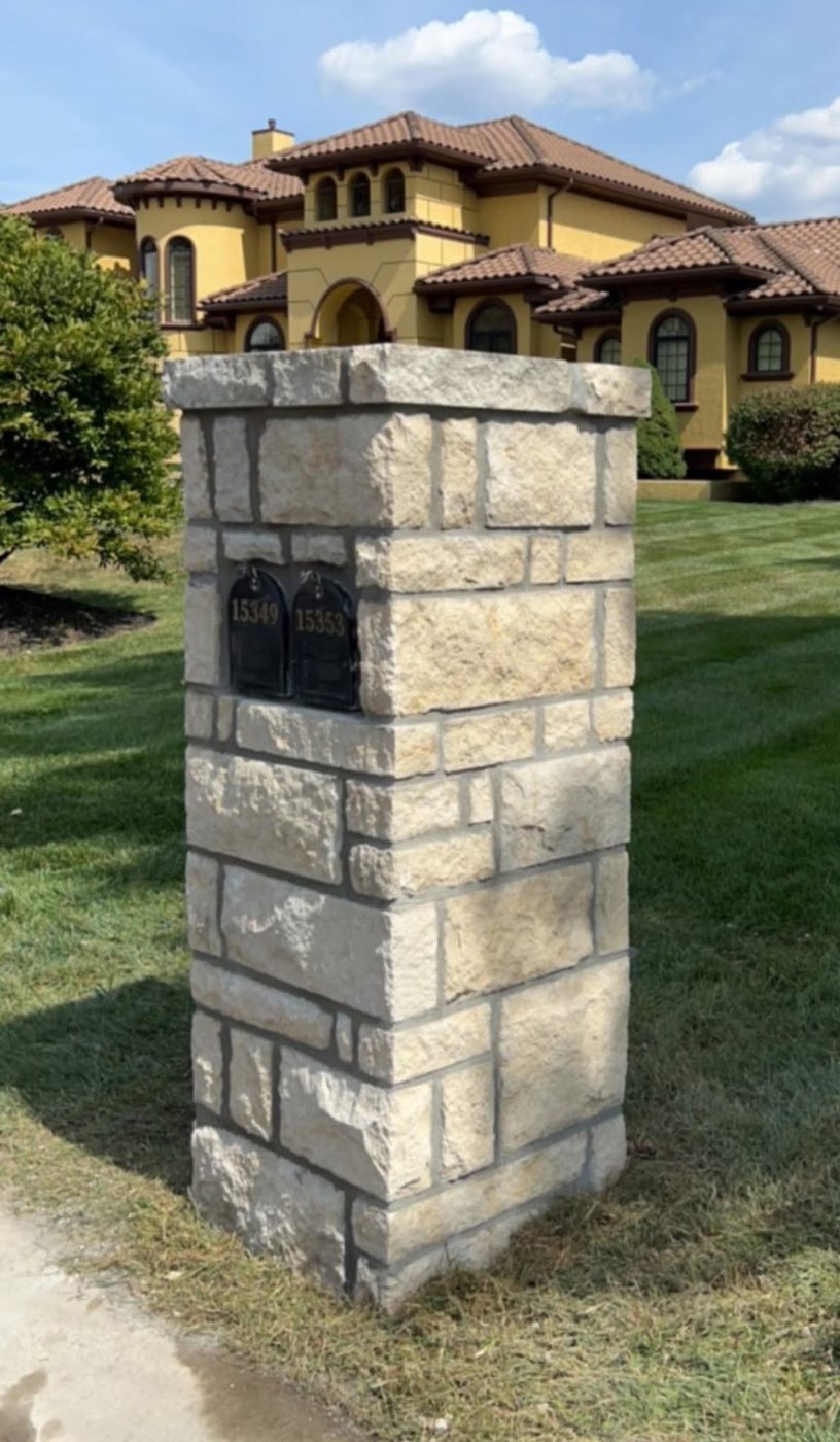 Light limestone mailbox column
