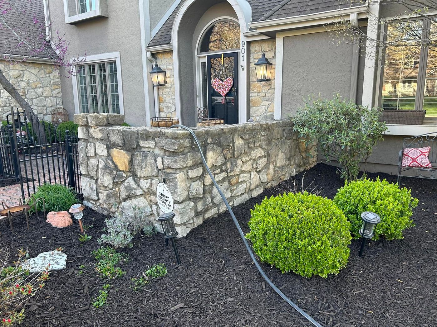 Stone garden wall before powerwashing